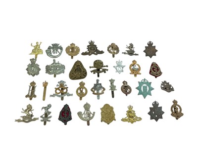 Lot 172 - Collection of approximately thirty British Military cap badges to include Duke of Edinburgh's Own Volunteer Rifles and Royal Army Medical Corps, (30).