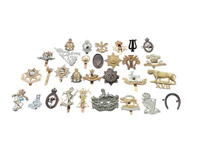 Lot 190 - Collection of approximately thirty British Military cap badges to include 12th Royal Lancers and Royal Corps of Signals, (30).