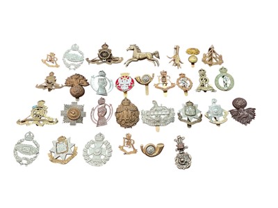Lot 193 - Collection of approximately thirty British Military cap badges to include Royal Artillery and Tank Corps, (30).