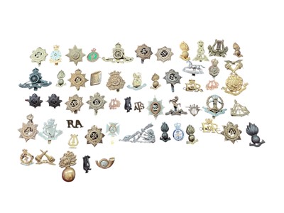 Lot 195 - Collection of approximately fifty British Military cap badges to include Reconnaissance Corps and Army Service Corps, (50).