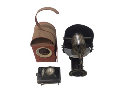 Lot 100 - Two vintage road lanterns together with one other portable vintage lantern