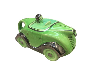 Lot 116 - Vintage Sadler racing car teapot, with impressed marks to base, approximately 22cm in length.
