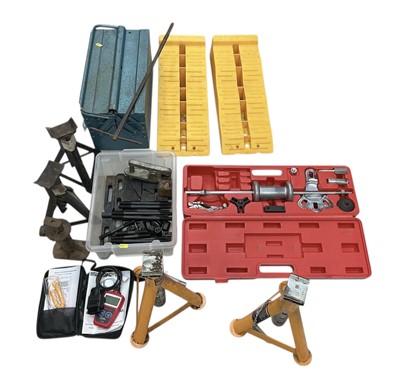 Lot 119 - Collection of assorted garage tools to include two pairs of axle stands, plastic ramps, metal toolbox, slide hammer and other items.