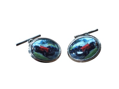Lot 104 - Pair of Gentleman's silver cufflinks, the panels decorated with motor racing scenes, each stamped 925.