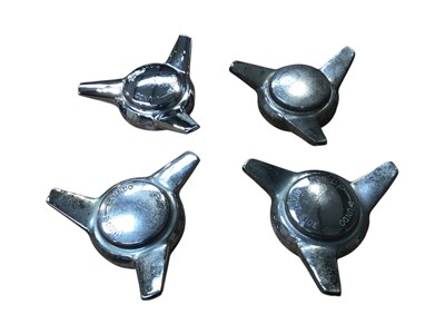 Lot 117 - Set of four chrome wheel spinners (one apparently unused), to suit Aston Martin DB6 models, (4).