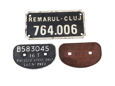 Lot 127 - Group of three cast iron train plaques together with a railway hi-vis work coat