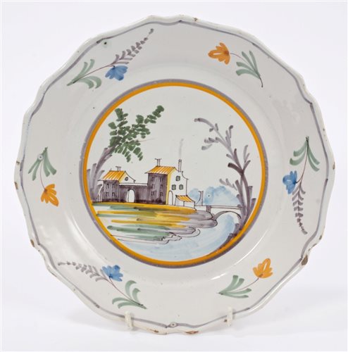 Lot 94 - 18th century French faience plate painted with...