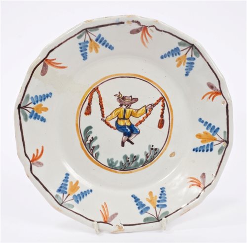 Lot 95 - 18th century French faience plate painted with...