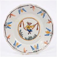 Lot 95 - 18th century French faience plate painted with...