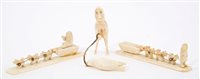 Lot 737 - Antique Inuit carved marine ivory figure of a...