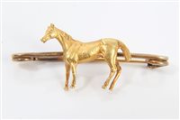 Lot 861 - Antique yellow metal bar brooch, mounted with...