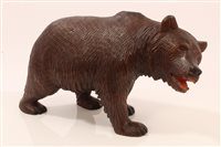 Lot 816 - Old Black Forest carved wooden bear with open...