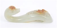 Lot 794 - Chinese carved green jade buckle in the form...