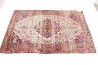 Lot 1430 - Antique Persian silk rug, cream ground centred...