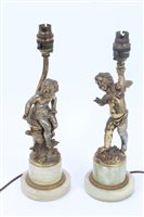 Lot 762 - Pair of early 20th century gilt spelter lamps...