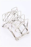 Lot 336 - Edwardian Silverer four-division toast rack...