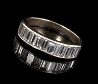 Lot 454 - Art Deco-style diamond half eternity ring, the...