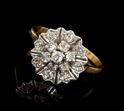 Lot 455 - Diamond cluster ring, the flower-head cluster...