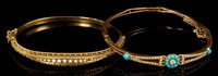 Lot 481 - Two Victorian hinged bangles - one bangle with...