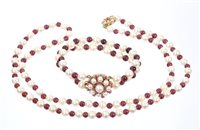 Lot 494 - Cultured pearl and garnet bead necklace and...