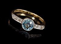 Lot 507 - Edwardian aquamarine and diamond ring with a...