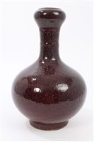 Lot 142 - Chinese sang de boeuf bottle vase with onion...
