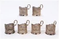 Lot 245 - Set of six Iranian Silverer filigree cup...