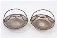 Lot 249 - Pair Georgian Silverer swing-handled sweetmeat...