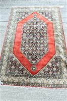 Lot 1432 - Good Persian silk rug, brick-red ground...