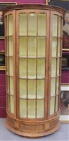 Lot 1447 - Glazed pine standing bow front display cabinet,...