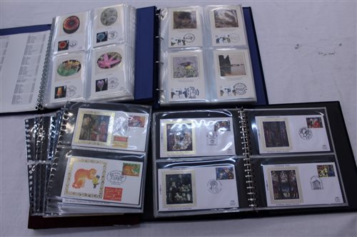 Lot 473 - Stamps - four albums of Benham Silk covers...