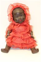 Lot 757 - Doll - early 20th century black Armand...