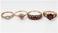 Lot 1204 - Four gold (9ct) gem set dress rings