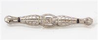 Lot 1212 - Art Deco-style platinum and gold (14k) bar...