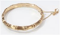 Lot 1214 - Gold (9ct) bamboo design hinged bangle with...