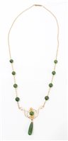 Lot 1245 - Art Nouveau-style gold and green hardstone...