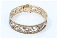 Lot 1251 - Gold (stamped 9k) three-colour bracelet with...