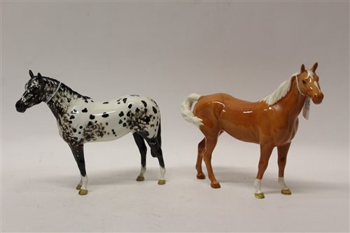 Lot 139 - Beswick Appaloosa stallion and one other...