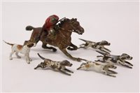 Lot 1738 - Cold-painted figure of a huntsman on horse,...