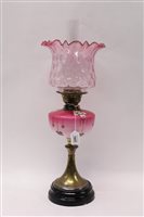 Lot 1607 - Victorian oil lamp with sun burner, pink...