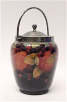 Lot 13 - Moorcroft pottery biscuit barrel decorated in...