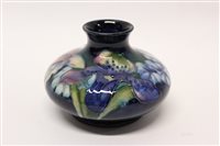 Lot 14 - Moorcroft pottery squat vase with floral...