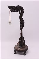 Lot 1606 - Chinese table lamp in the form of a Carsved...