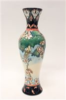 Lot 23 - Moorcroft pottery vase decorated with flowers,...