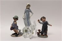 Lot 51 - Two Elisa figures - girl with bucket and dog...