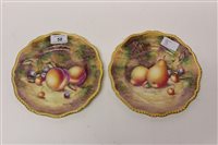 Lot 58 - Pair of Royal Worcester plates with gilt rim...