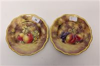 Lot 59 - Pair of Royal Worcester plates with gilt rim...