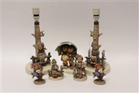 Lot 62 - Two Hummel table lamps - each decorated with a...