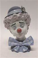 Lot 72 - Lladro porcelain bust - Clockswn with sad face,...