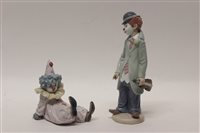 Lot 73 - Two Lladro porcelain Clockswn figures - one...